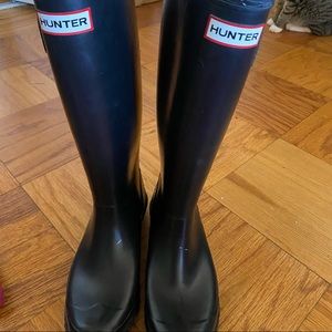 Tall black Hunter rain boots